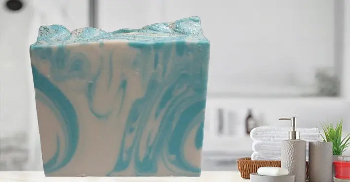 a blue vase sitting on top of a table